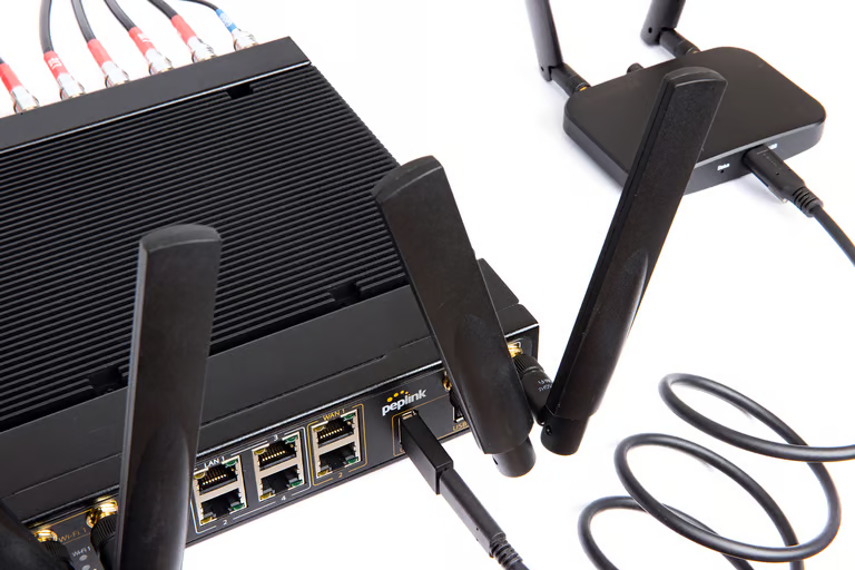 MBX Mini 5G router with external antennas attached showing full deployment setup